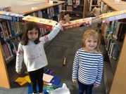 photo of girls with a gingerbread man