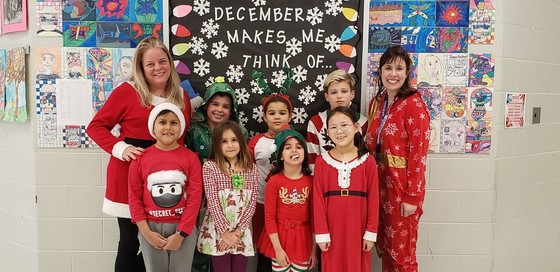 students and teachers in holiday wear