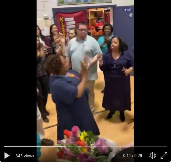 Cardinal Forest ES Principal is surprised by school staff and students.