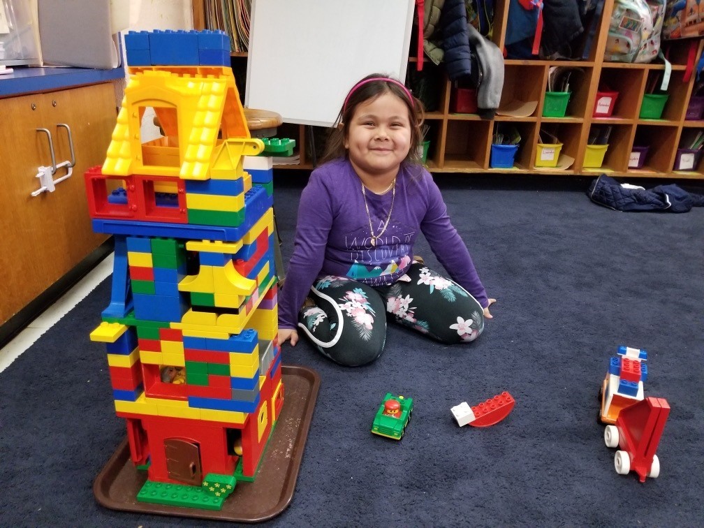 Kindergarten student smiling
