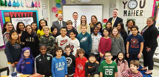 Miss Mikesell with students administration and region 5 leadership team