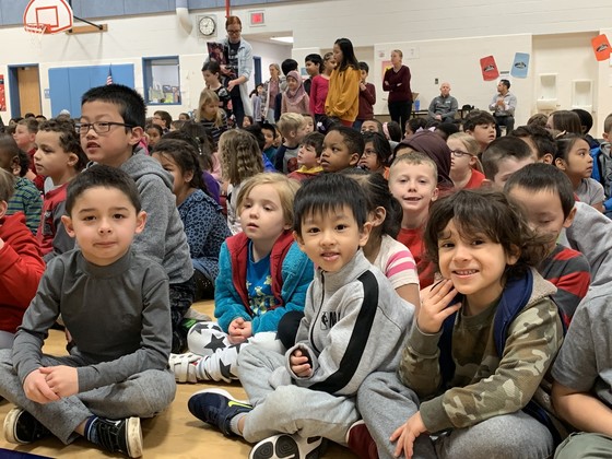 photo of students at an assembly