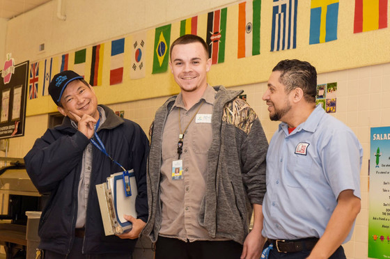 Facilities staff members helping out at Beech Tree ES