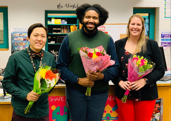 Poe MS staff members holding flower bouquets.