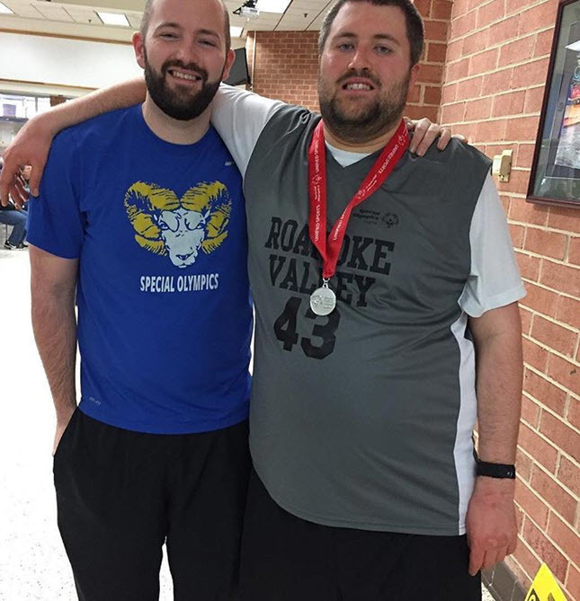 Kevin Crenshaw (left) worked as an Extended School Year teacher at Carson MS this summer. Kevin's brother (right) is his inspiration. 