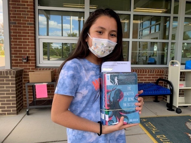 6th grader and library books