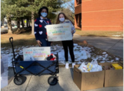 Two people collecting donations