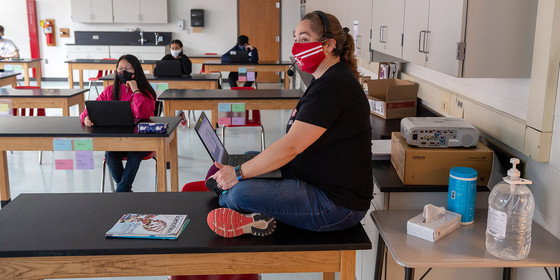 Teacher in classroom with students