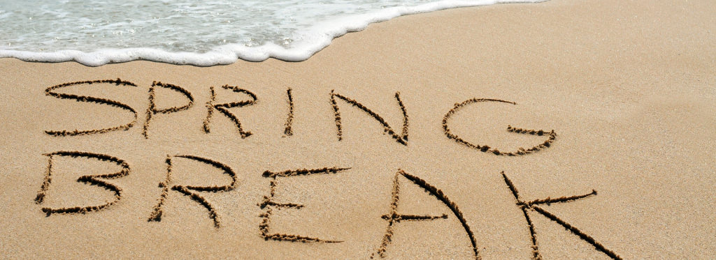 Picture of words "Spring Break" written in sand