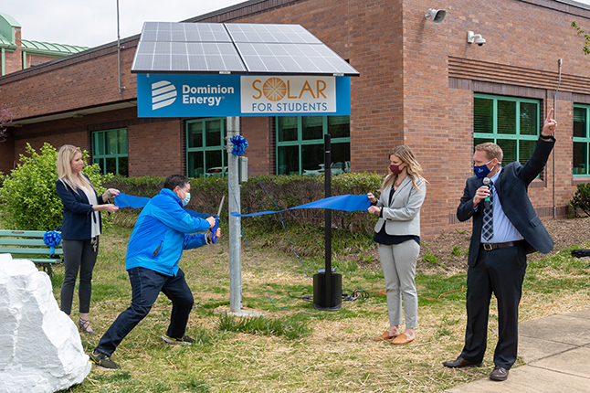 photo of staff at Centreville ES solar ribbon cutting ceremony