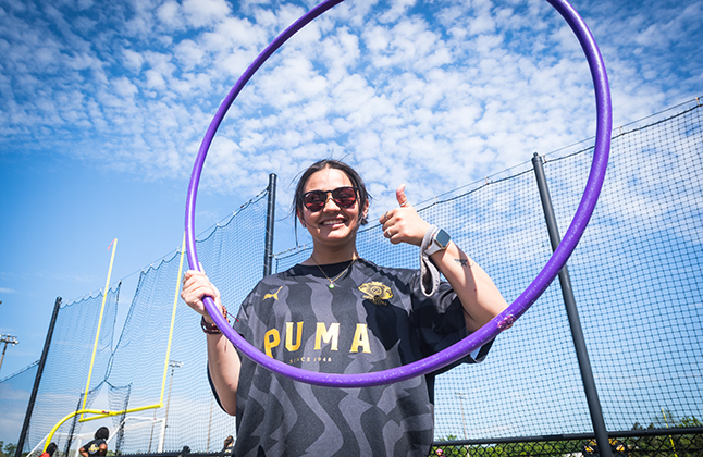 photo of Westfield HS teacher Sofia Wainwright holding a hula hoop