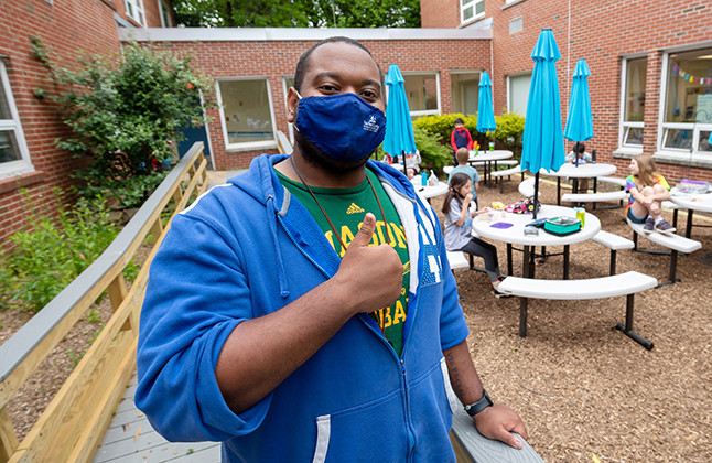 photo of Chesterbrook ES teacher Justus Harris giving a thumbs up