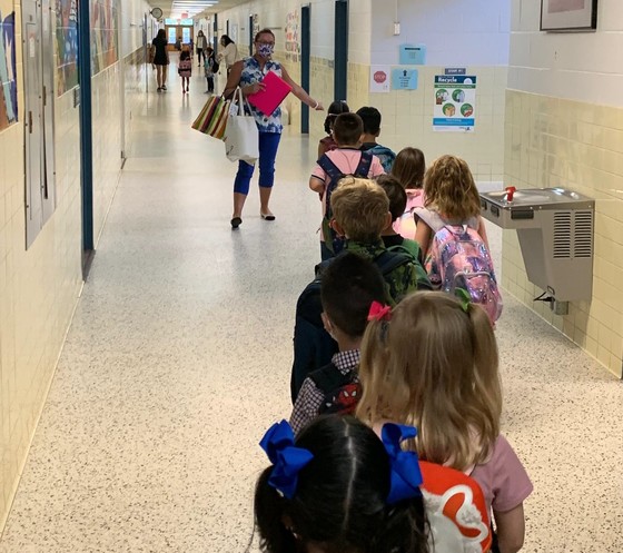 kinders walking the halls on their first day of school