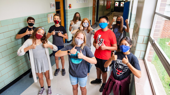 Students giving a high five