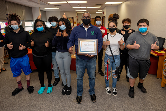 photo of Howard Brewer and students