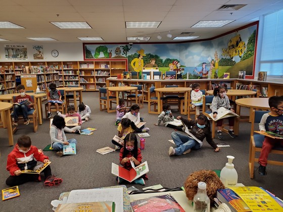 Photo of students in the library