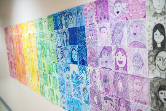 Picture of several children's drawings next to each other. 