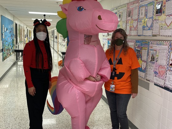 Ms. Salata in a pumpkin shirt, Ms. Younger dressed at a ladybug, and Ms. McMahan dressed as a pink unicorn.