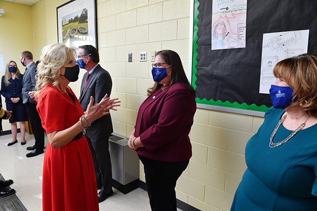 photo of First Lady Jill Biden talking with SB Chair Stella Pekarsky and Principal Kathleen Quigley