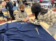SCMS students making a blanket for a veteran