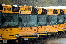 School buses in snow.