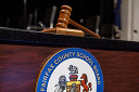 School Board logo with gavel.