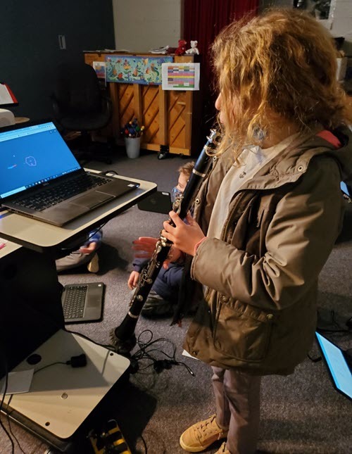 girl playing clarinet