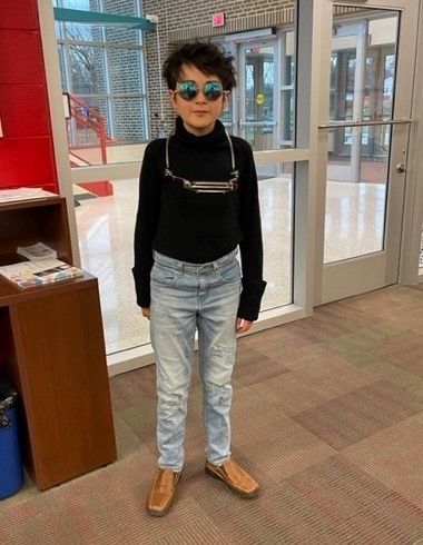 Milo Oliver dressed as Bob Dylan for Dress Like a Famous Person Day.