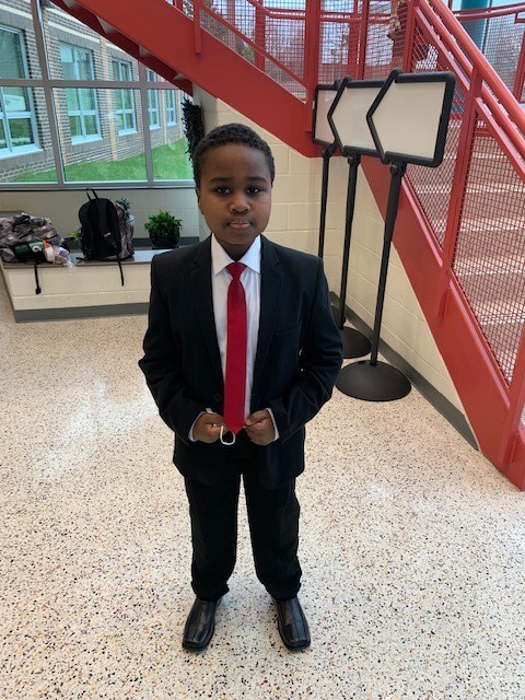 A student dressed up for Famous Person Day.