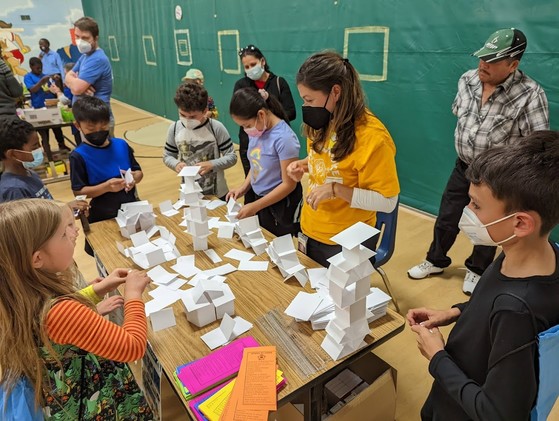 Photo of children and families participating in STEAM activities