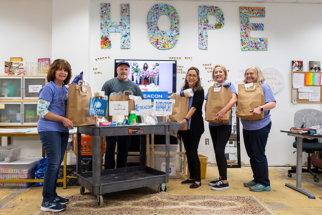 Not for profit She Believes in Me in their warehouse space donated to them by Rappaport, a regional property management company.