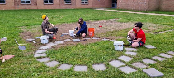 Pi Rogers and friends work on math garden