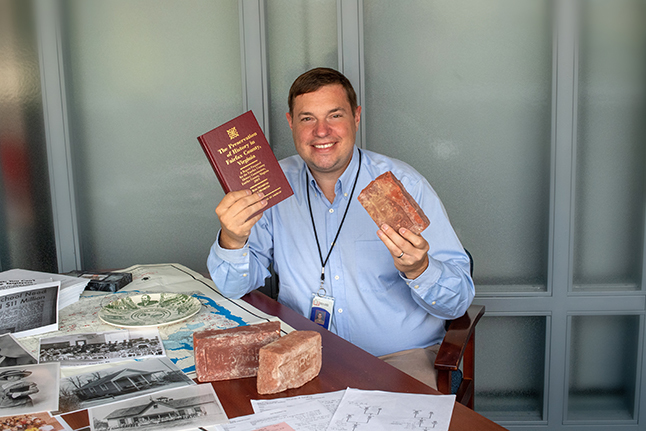 Videographer Jeff Clark with historic artifacts. 
