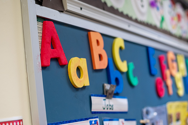 Letters of the alphabet displayed on a bulletin board