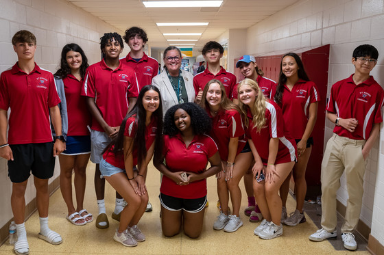 Dr. Reid with Woodson Students