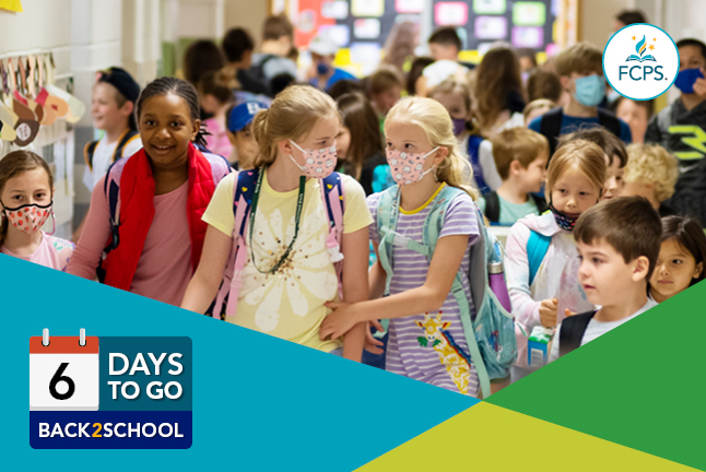 Two girls walk through a crowded hallway. 6 Days to go. Back 2 School.