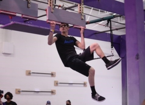 Max Feinberg practicing American Ninja skills in a gym