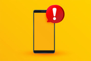 Image of a cell phone with an exclamation in a red conversation bubble