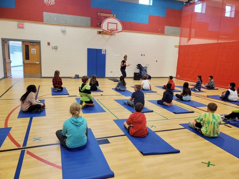 Clermont students practicing yoga