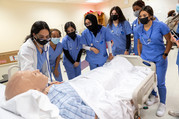 Students around a patients bed