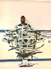 johnson taped to wall