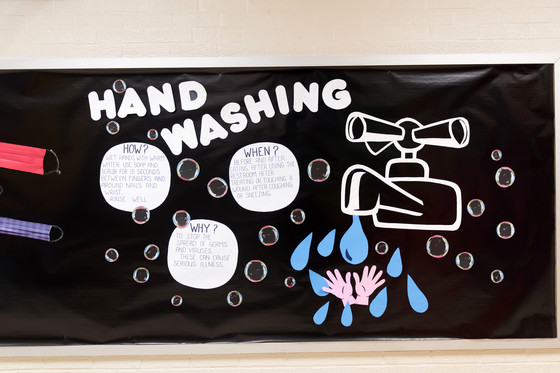 Handwashing art on a bulletin board