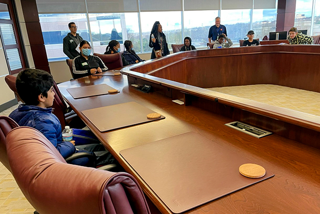 Herdon Middle School students visiting the offices at Northwest Federal Credit Union including where the decisions are made - the board room.