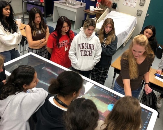 Chantilly Academy students with anatomage table