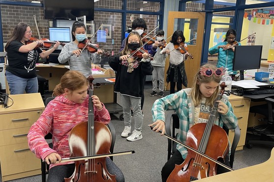 Strings students performed in the office this week.