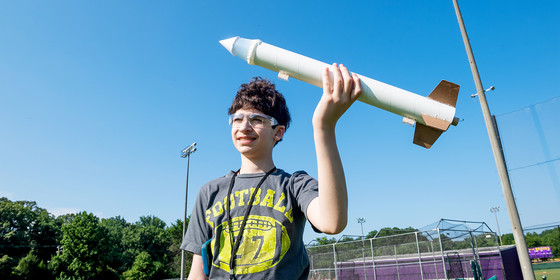Student with rocket