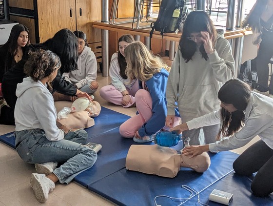 Students practicing CPR