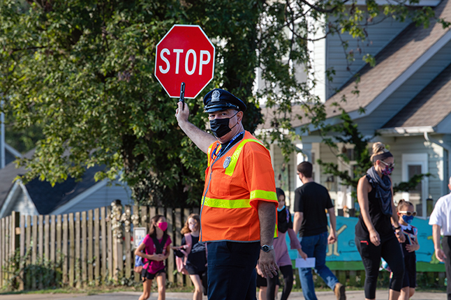 Crossing guard with stop sign