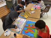 students painting