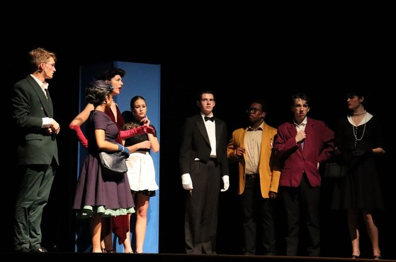 Students on stage for a play